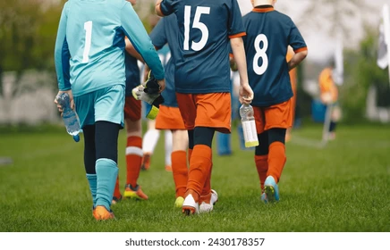 young-boys-sports-team-walk-260nw-2430178357